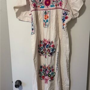 Embroidered White Dress with Colorful Floral Patterns